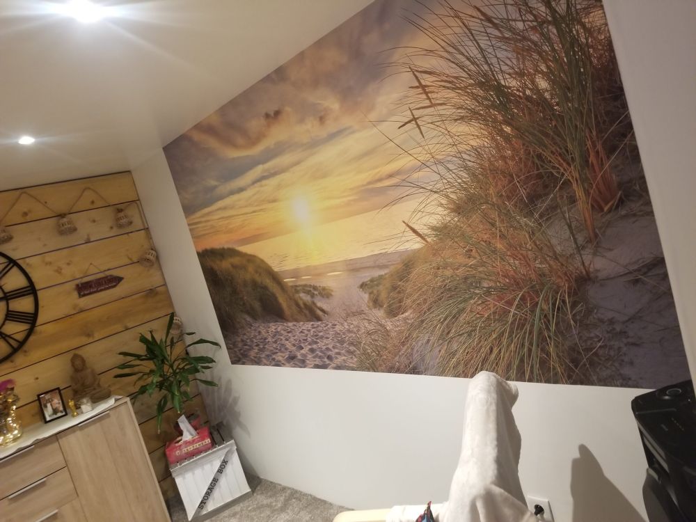 Zonsondergang aan duinstrand