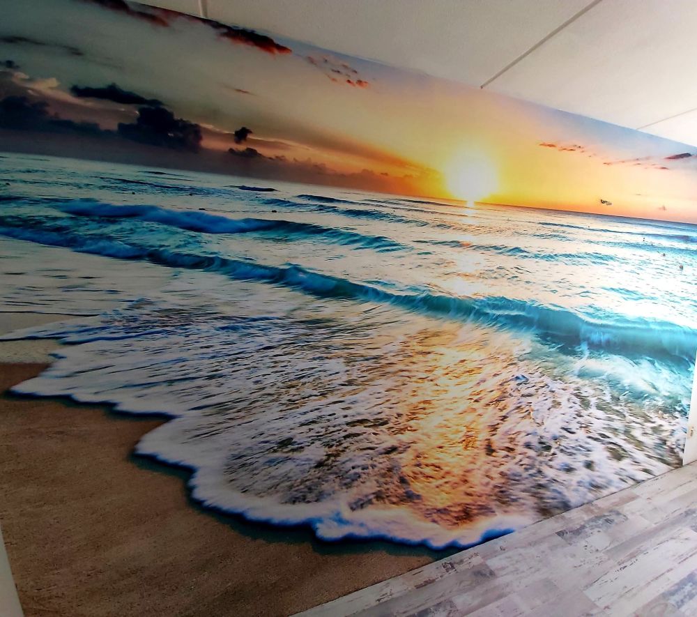 Behang met zonsondergang boven zee