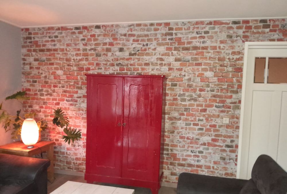 Bakstenen muur gerestaureerd