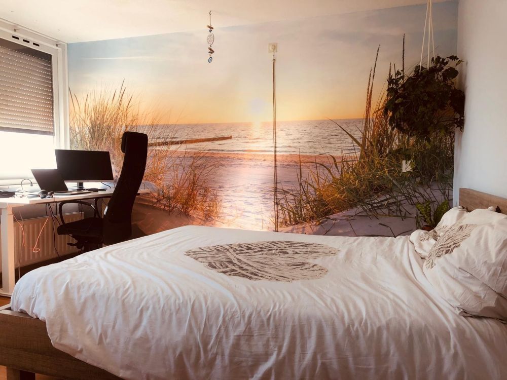 Duinstrand met zonsondergang