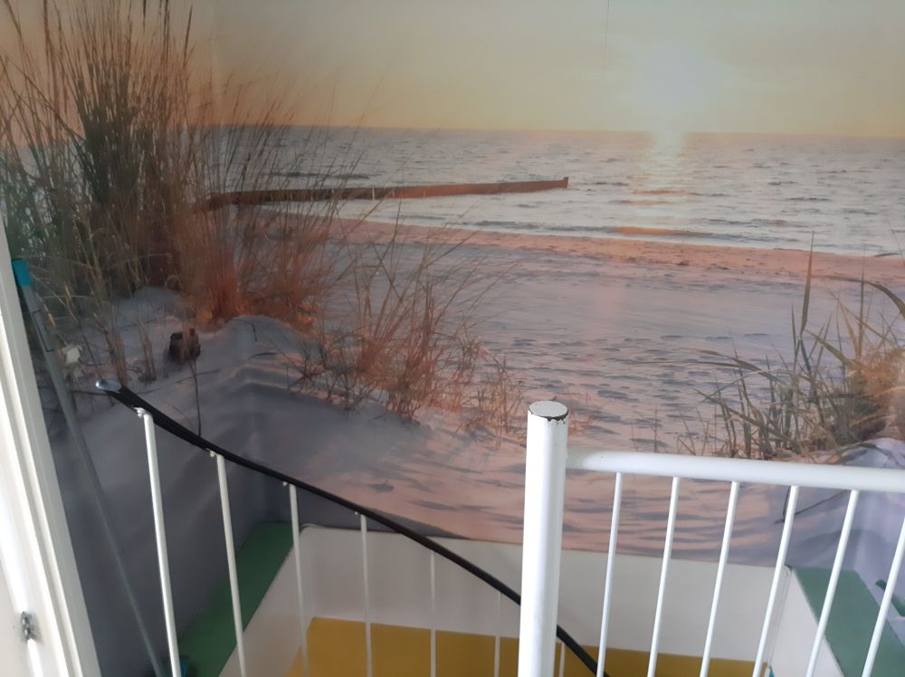Duinstrand met zonsondergang