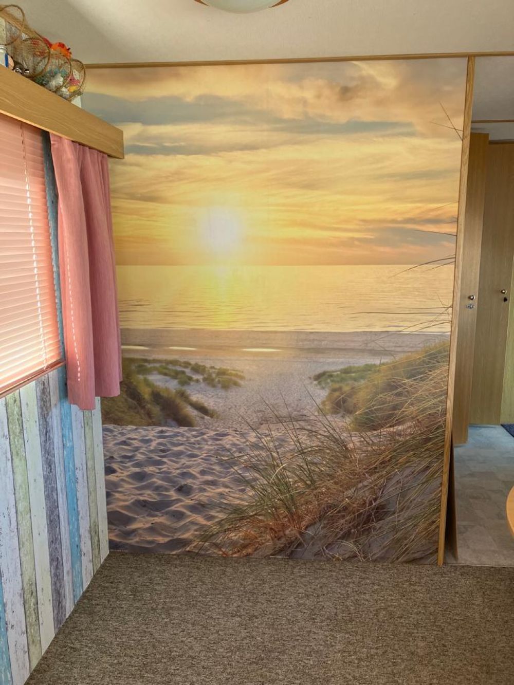 Zonsondergang aan duinstrand