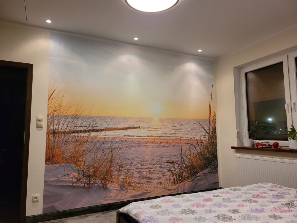 Duinstrand met zonsondergang