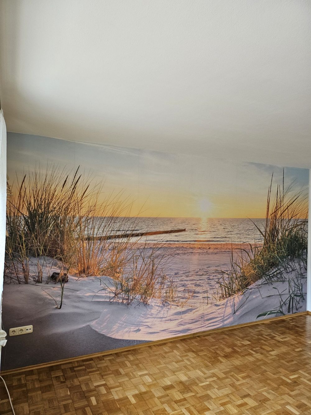 Duinstrand met zonsondergang