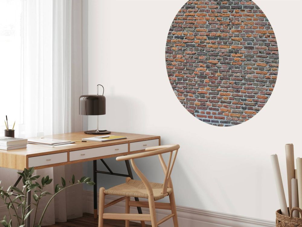 Gerestaureerde oude bakstenen muur