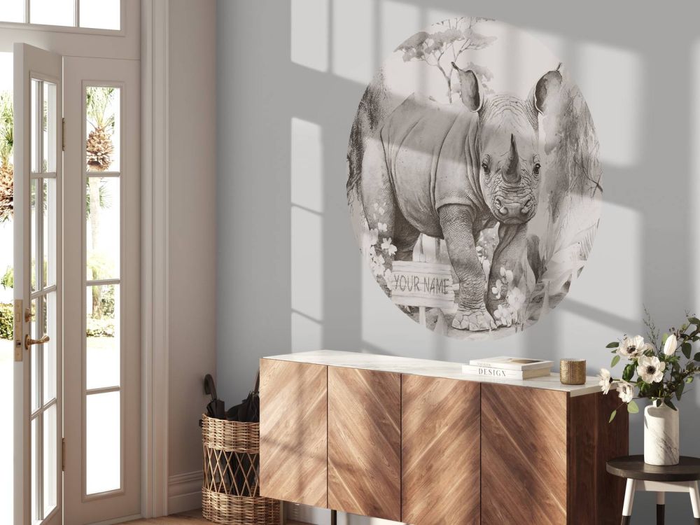 Baby neushoorn op de savanne beige