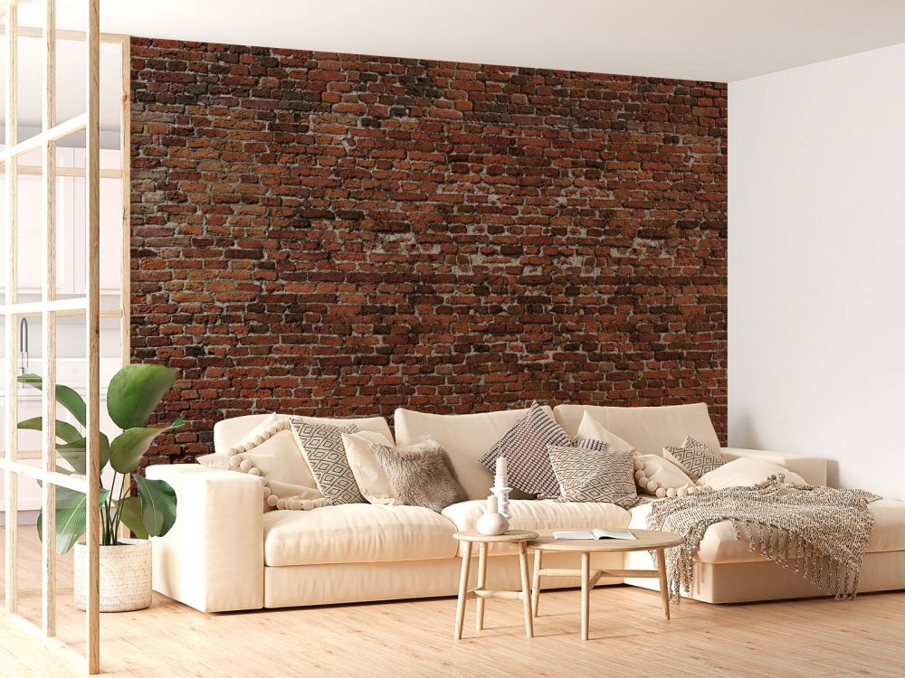 Oude gerestaureerde bakstenen muur