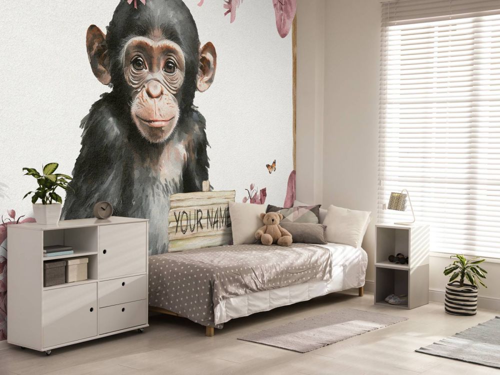 Baby chimpansee in de jungle roze