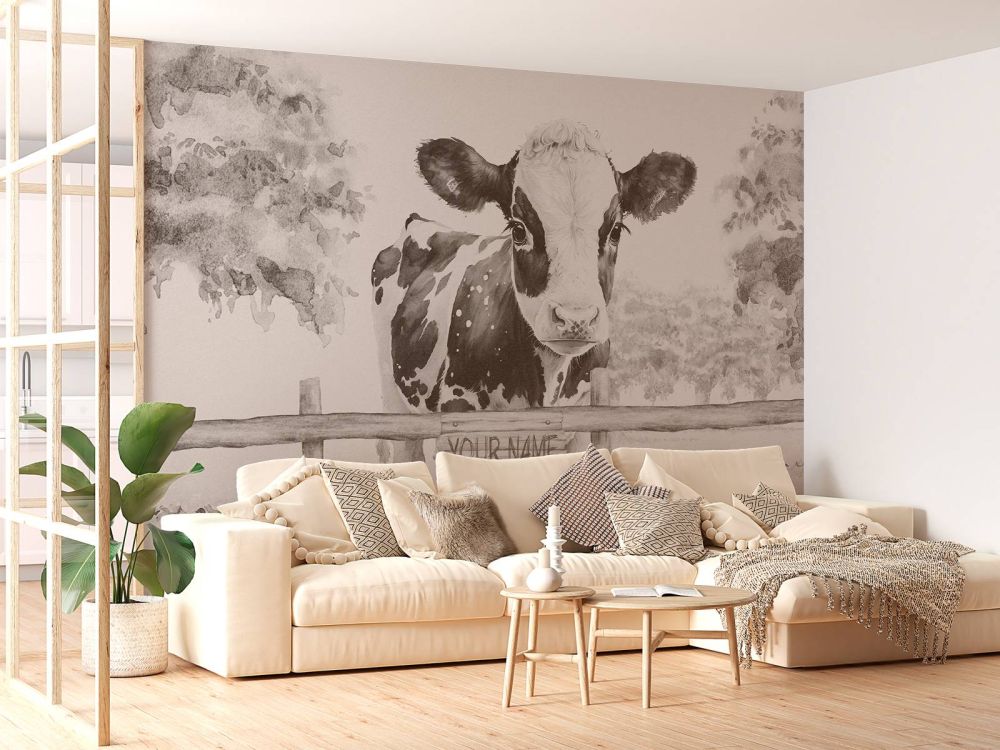 Jonge koe in een weiland beige