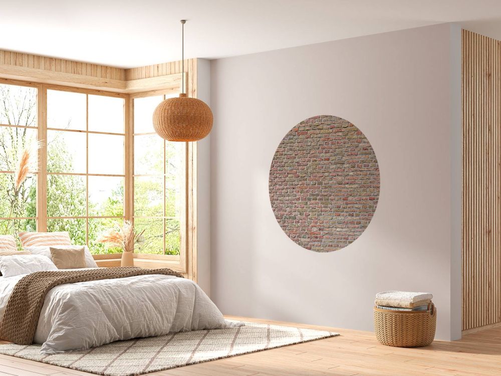 Bakstenen muur met gerestaureerde voegen