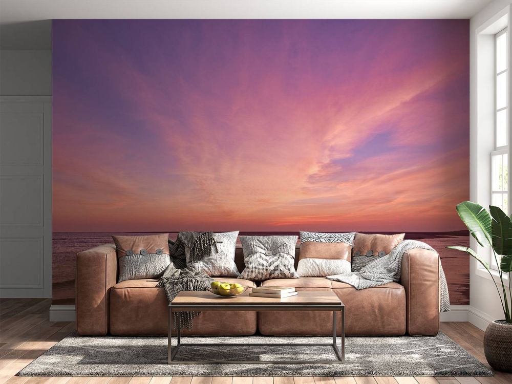 Strand met roze zonsondergang