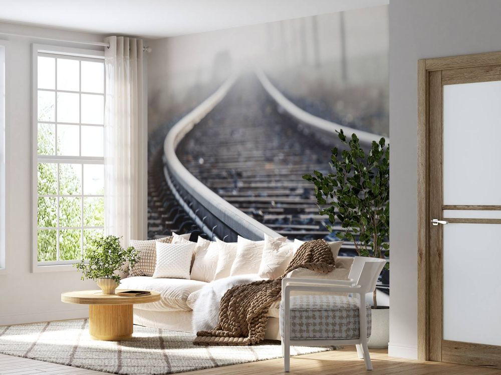 Treinspoor in de ochtendnevel