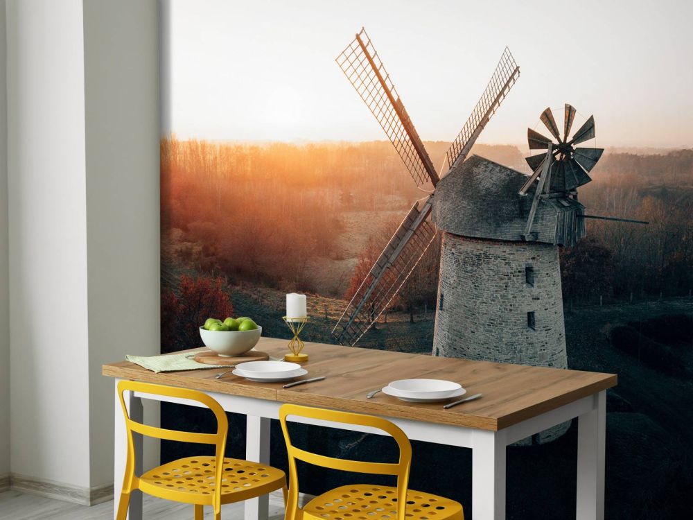 Windmolen in prachtig licht bij zonsondergang