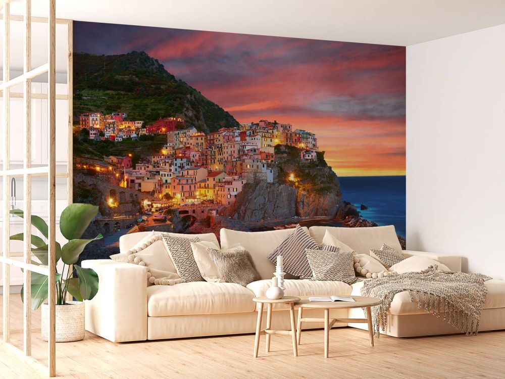 Italiaans stadje bij zonsondergang