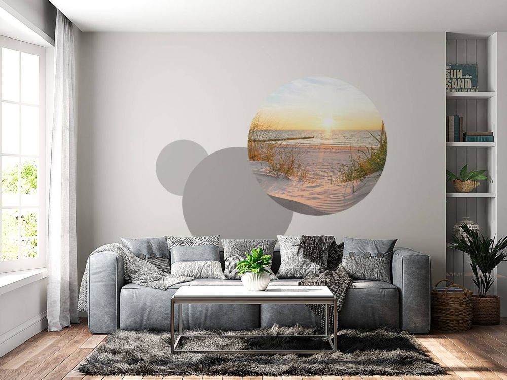 Duinstrand met zonsondergang