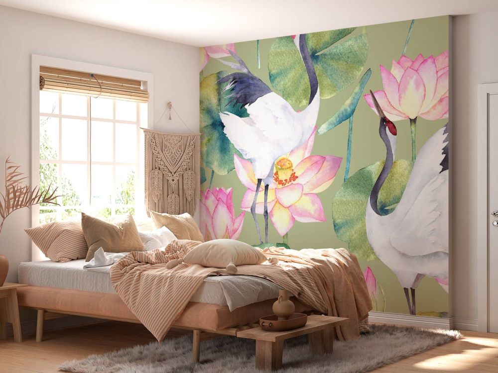 Kraanvogels tussen de bloemen