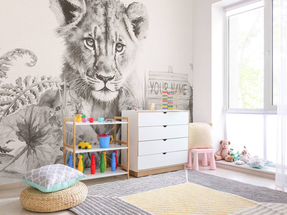 Jonge leeuw in de jungle beige