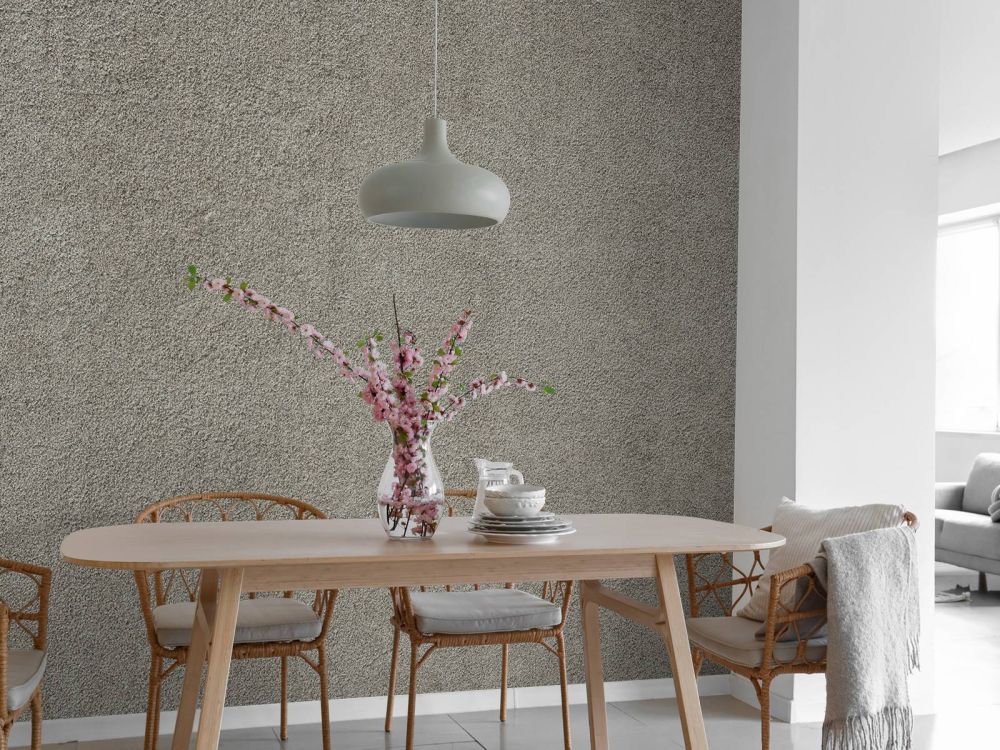Betonnen muur met fijne steentjes