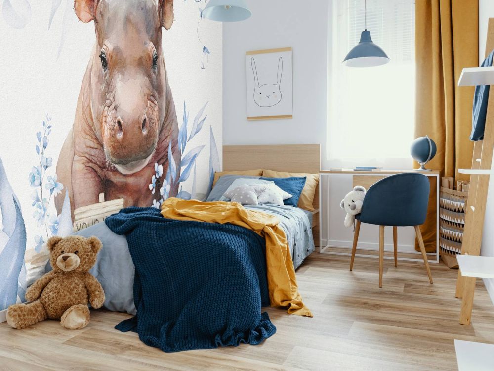 Baby nijlpaard in de bladeren blauw