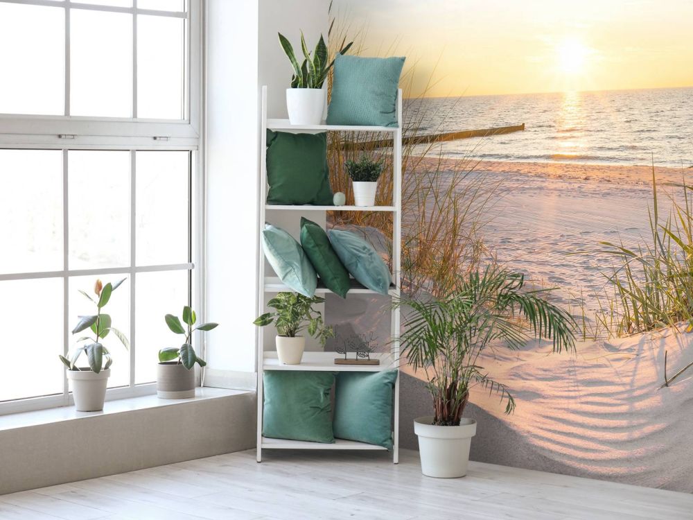 Duinstrand met zonsondergang