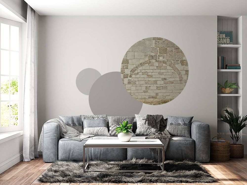 Oude stenen muur met boog