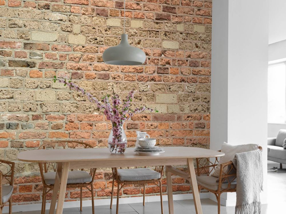 Muur met verschillende bakstenen