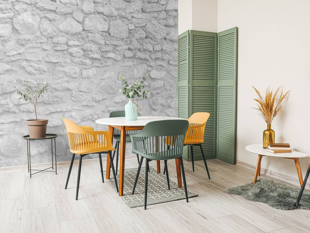 Lichte muur met grove stenen
