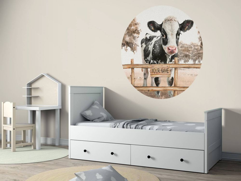 Jonge koe in een weiland taupe