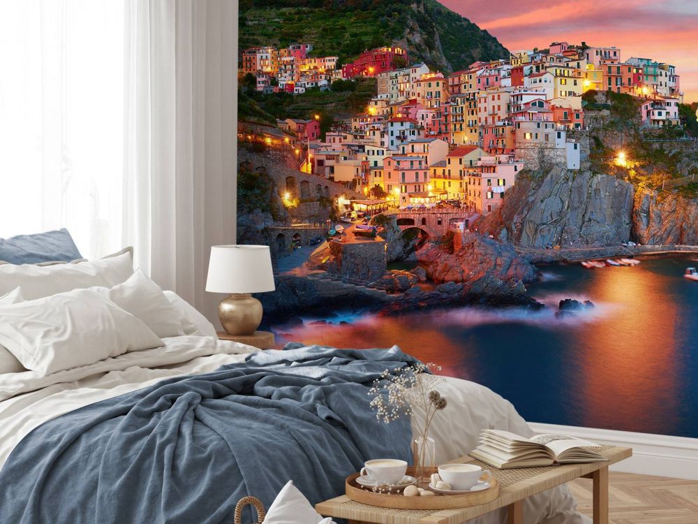 Italiaans stadje bij zonsondergang
