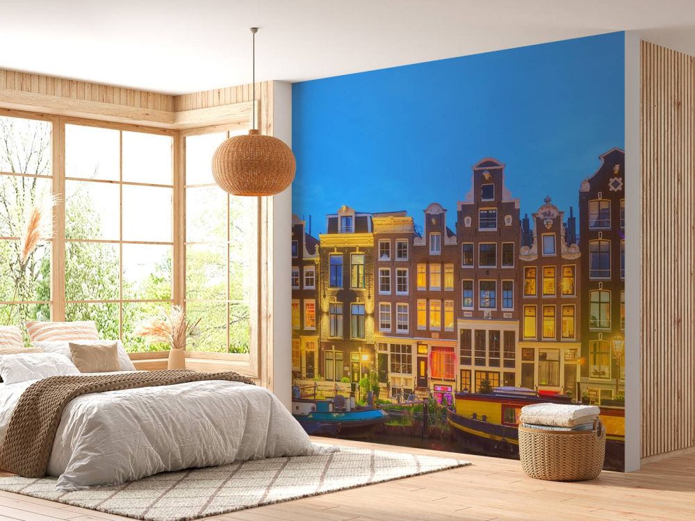 Amsterdamse huizen in de nacht