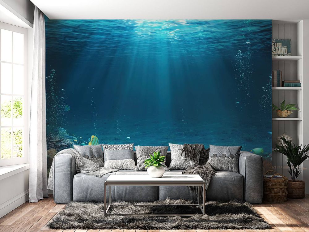 Zonnestralen door het water