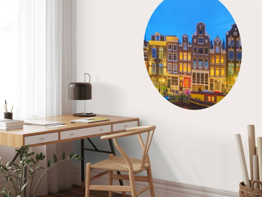 Amsterdamse huizen in de nacht