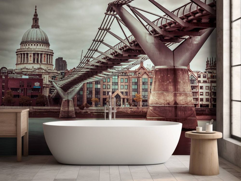 View of St Paul's Cathedral and Millennium Bridge from river thames, London, UK