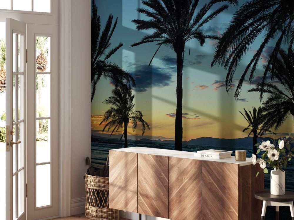 Palmbomen bij zonsondergang