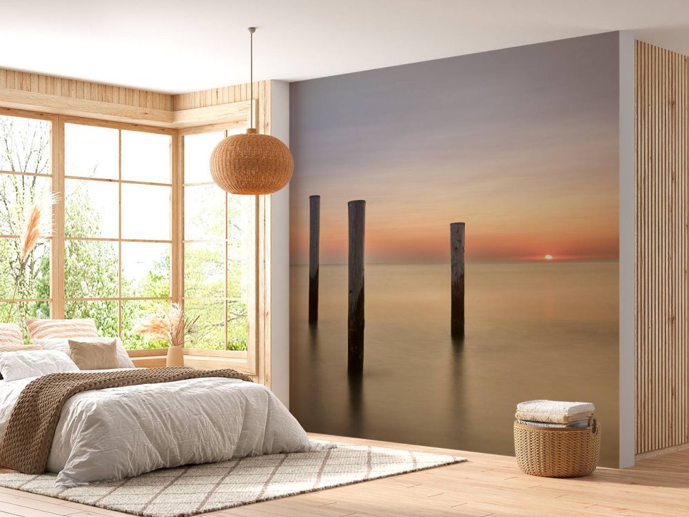 Drie houten palen